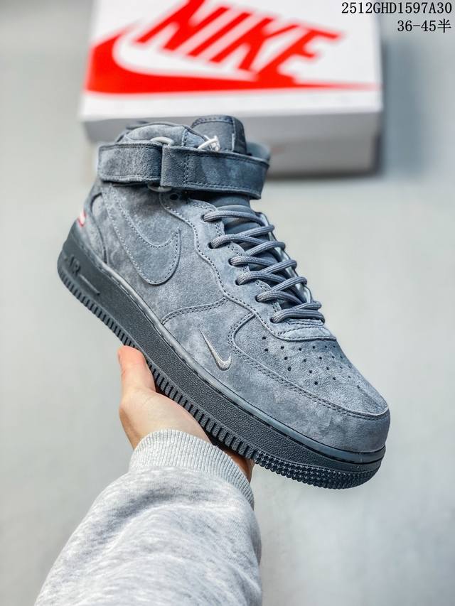 A textured explosion of grey suede! The Supreme x Nike Air Force 1 Mid collabora A textured explosion of grey suede! The Supreme x Nike Air Force 1 Mid collabora